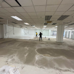 empty office space with ceilings and concrete floors